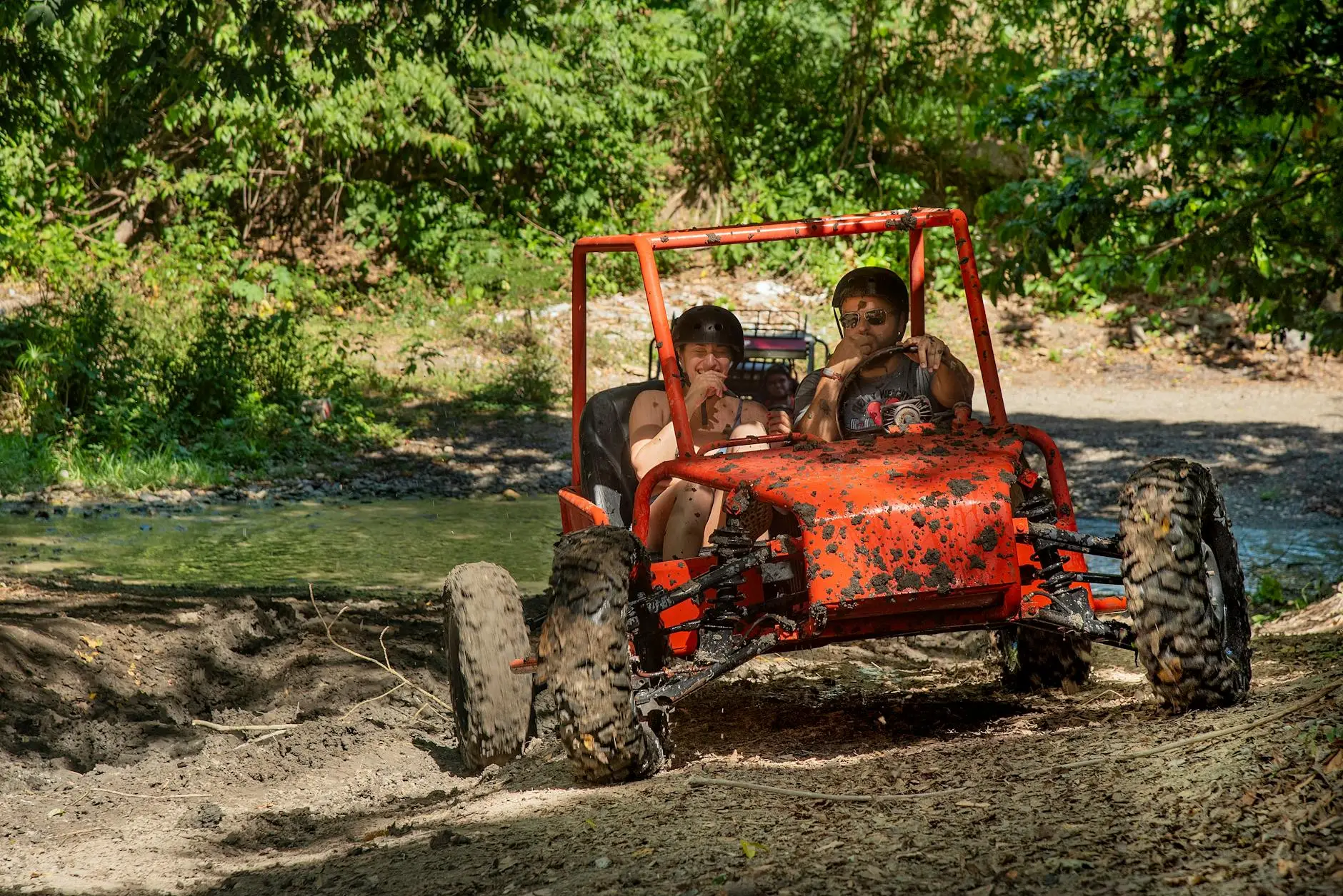 Tandem UTV buggy tour in Bali's rugged landscape offers adventurous offroad experiences.